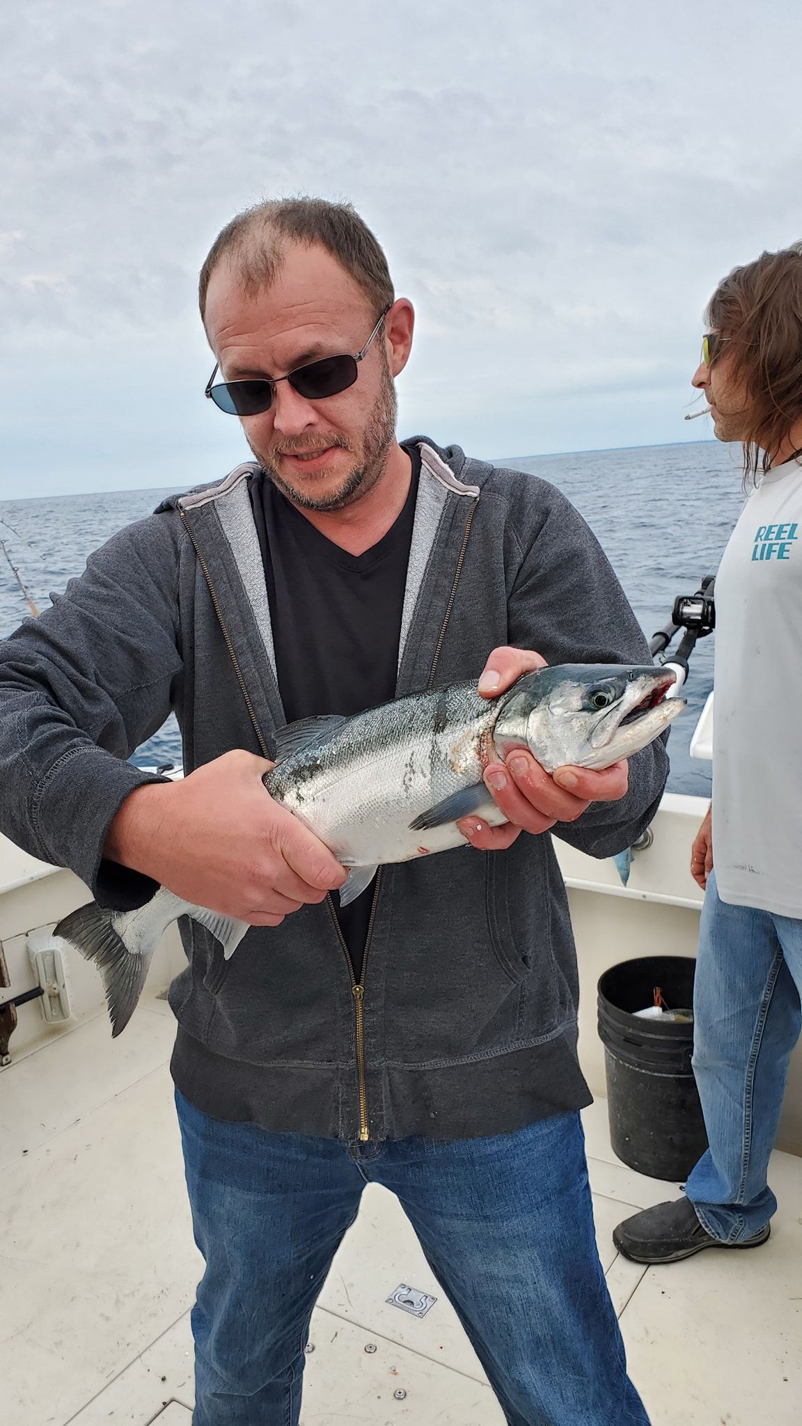 Angler catches a silver carp