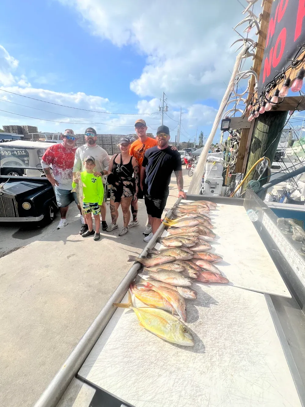 Five anglers fishing in unknown location