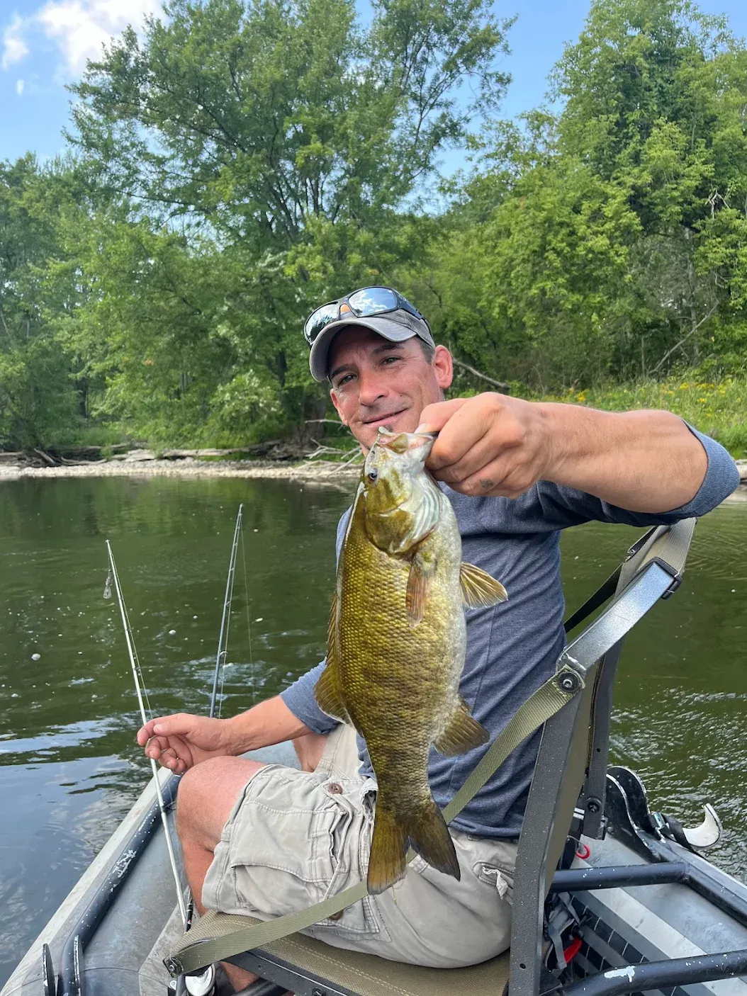 A person fishing in an unknown location
