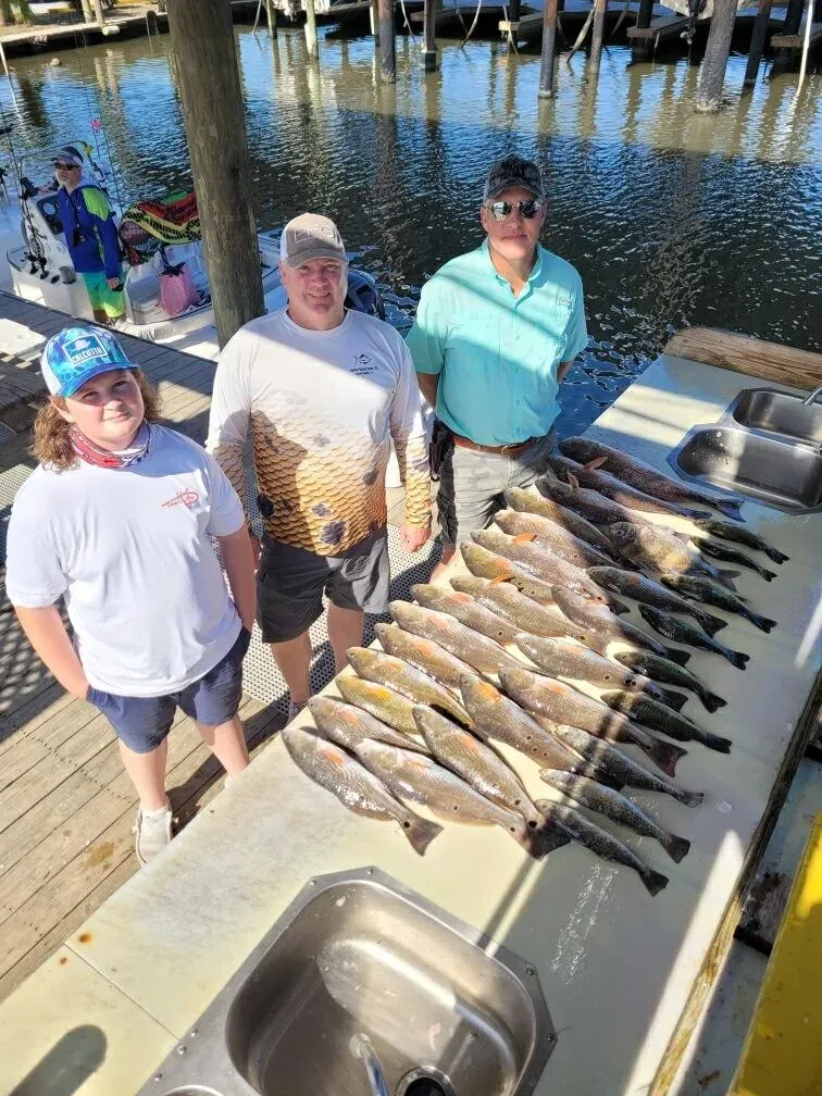 Four anglers fishing in an unspecified location