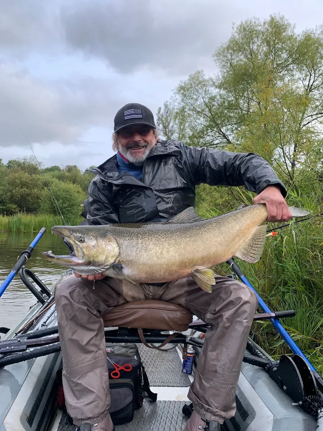 Lone angler fishing at unknown location