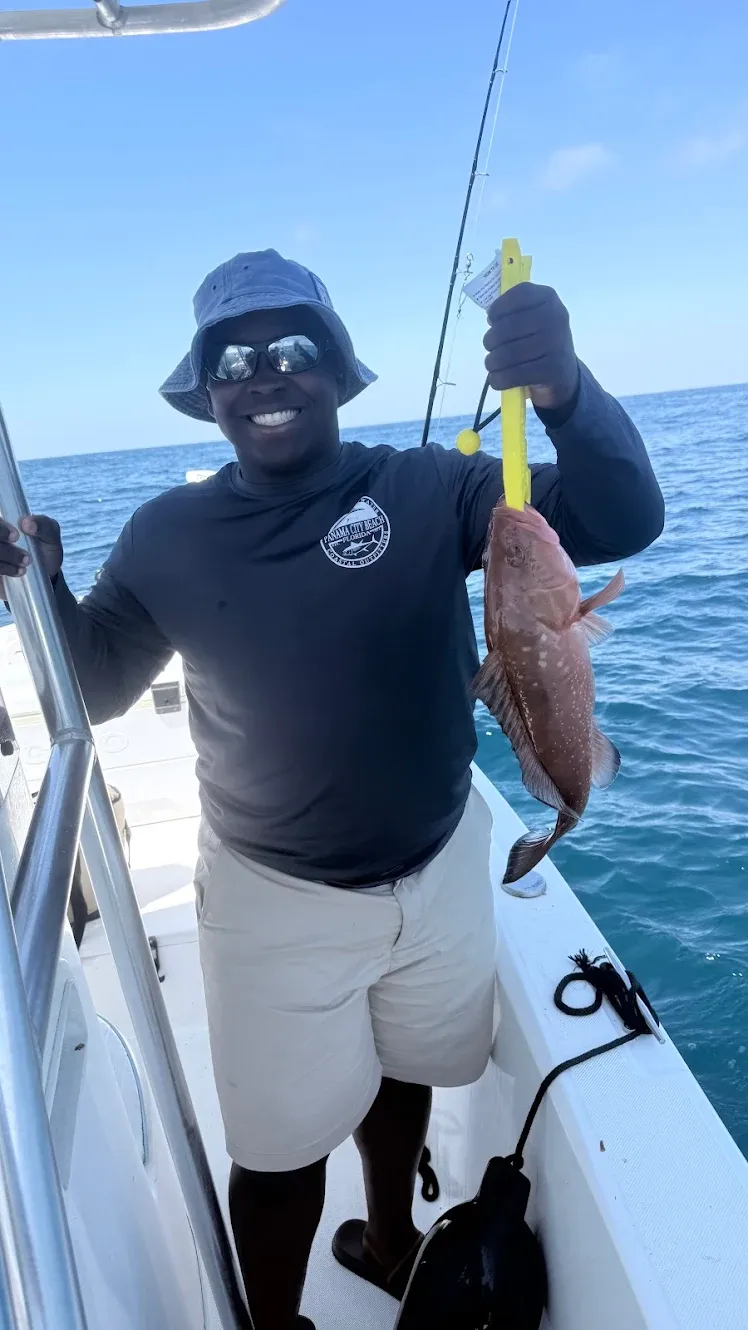 Red grouper caught while fishing from boat on ocean