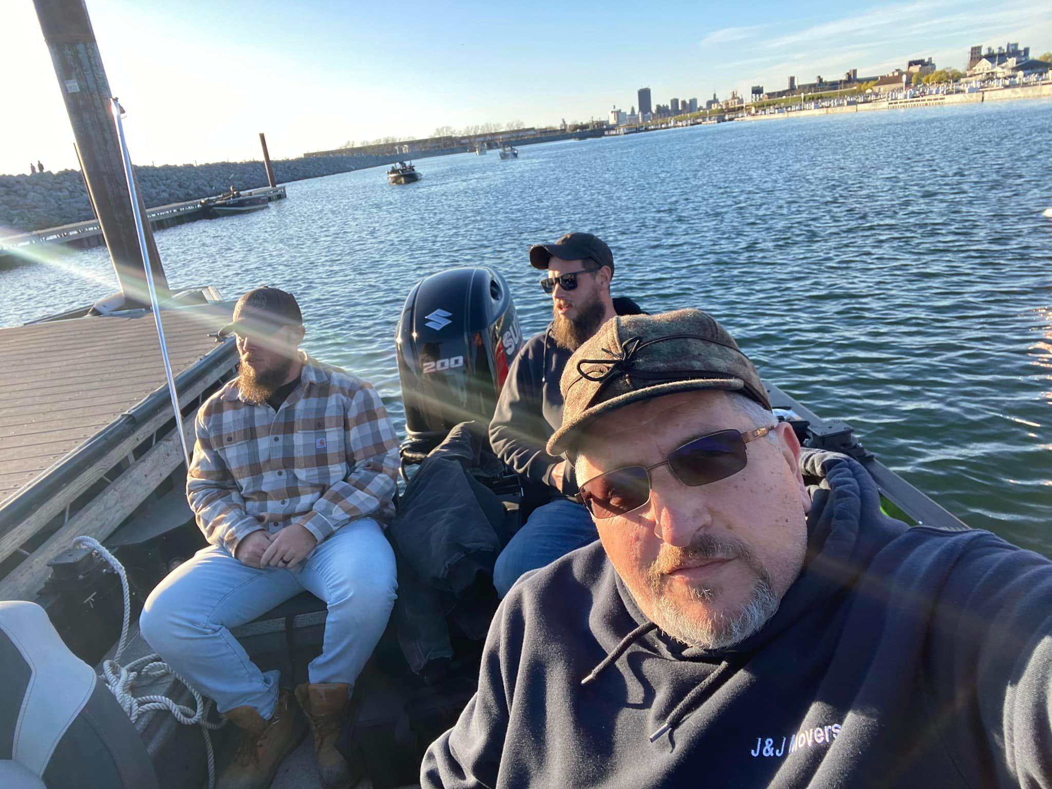 Two people fishing at a scenic location