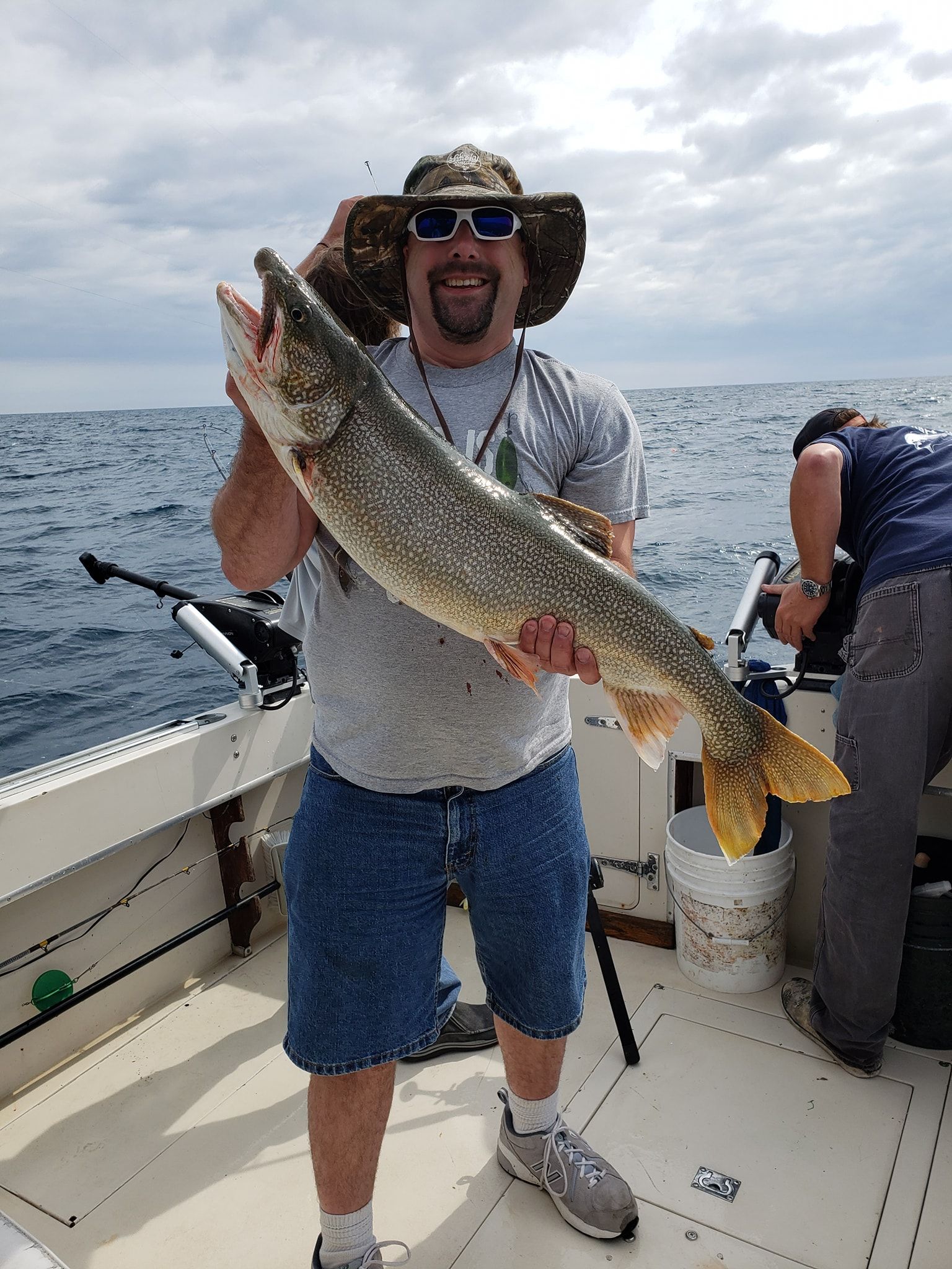 Solitary angler fishing in unknown location