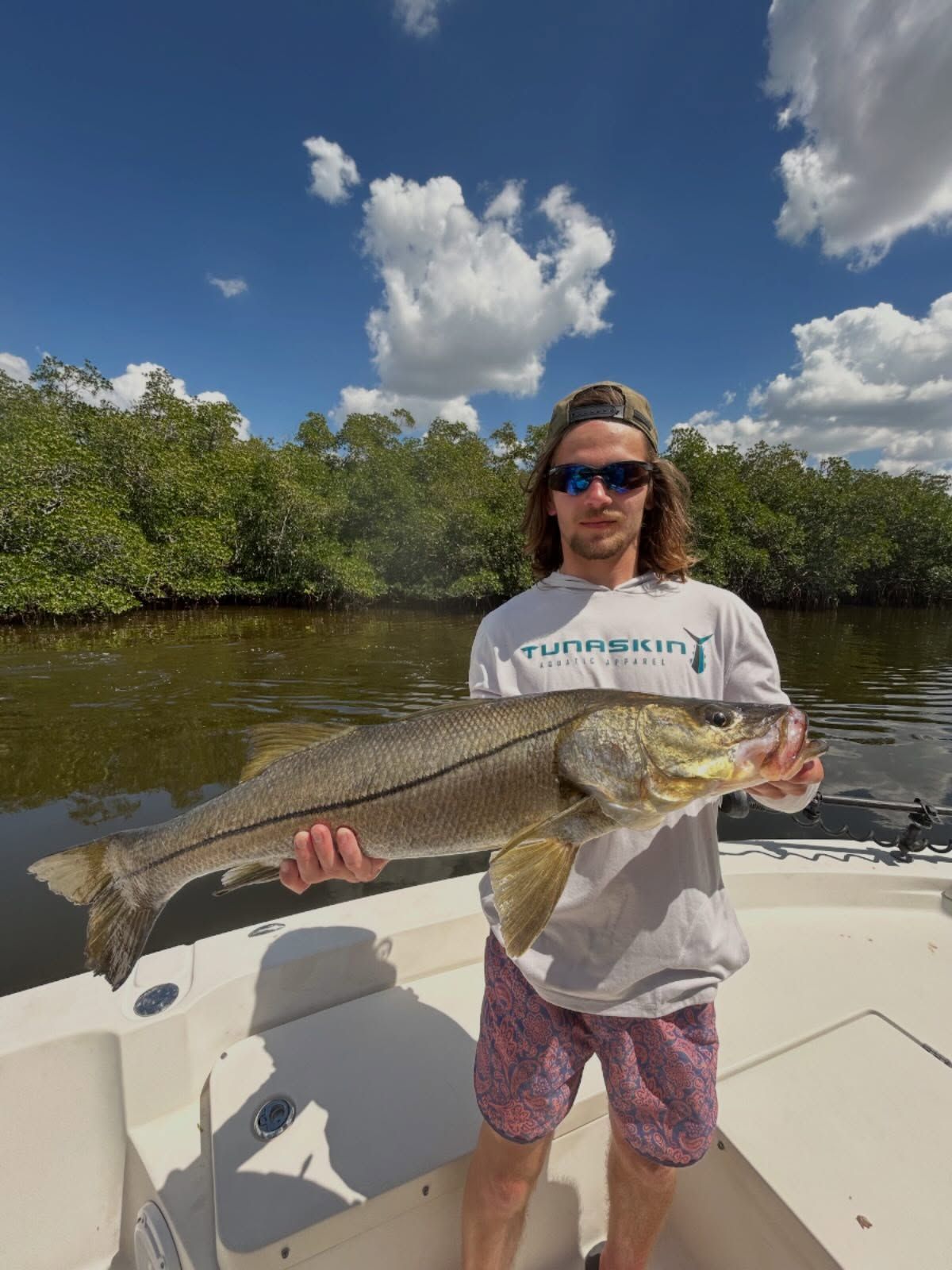 Aidan landed a strong fish after an exciting battle on light tackle, with more quality trips ahead for anglers looking to hook into a stud snook. fishing report coverpicture
