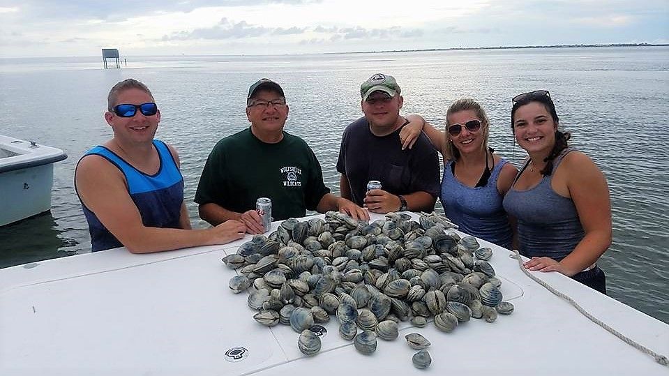 Team Dempsey Guide Service Clamming in North Carolina fishing Inshore