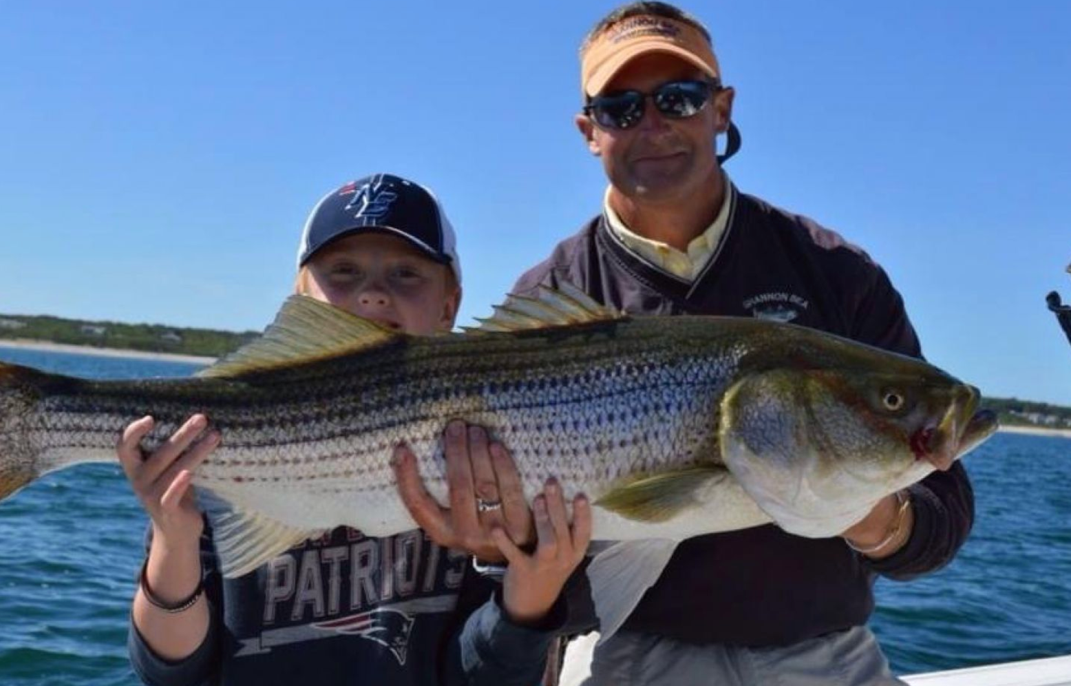 Striped Bass fishing charters in Massachusetts. Charter fishing for Striped  Bass along the shores of Cape Cod.
