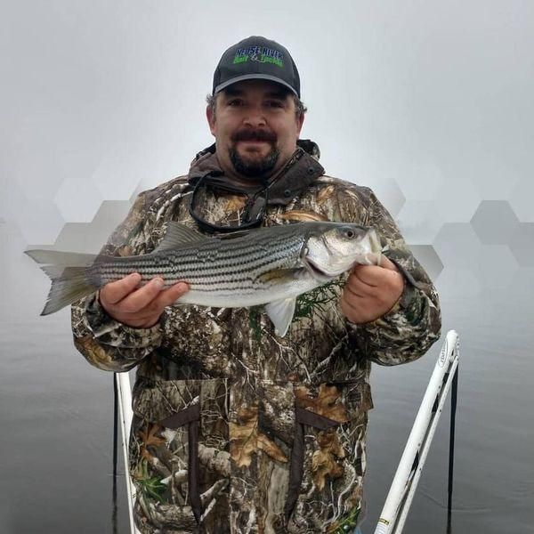 Striped bass fishing in unknown location