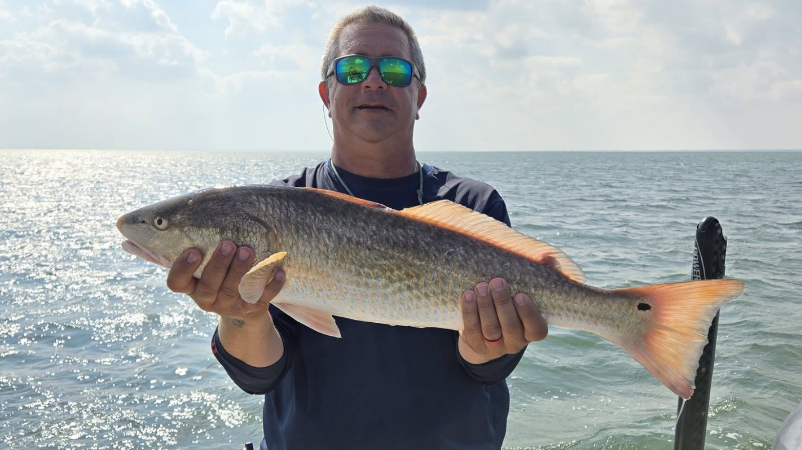 Fish in the box with Capt. Marc