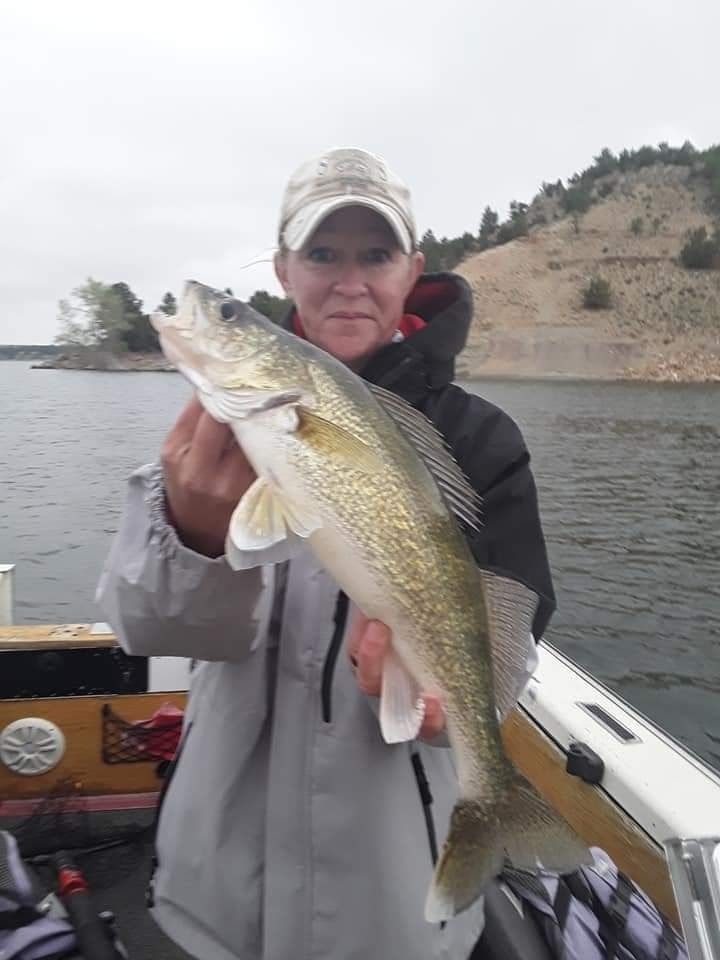 BadAss Fishing Adventures, LLC. Fishing in Wyoming | 8 Hour Charter Trip  fishing Lake