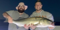 Against The Wind Fishing Nightfall Striped Bass Adventure: Fishing under the Stars! fishing Inshore 
