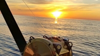 Seabbatical Charters Sunset Fishing Trip in North Carolina fishing Offshore 