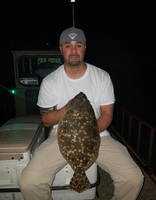 Shallow Encounters Flounder Gigging Charter