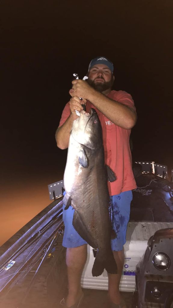 Angler holding a 31-inch fish in FL