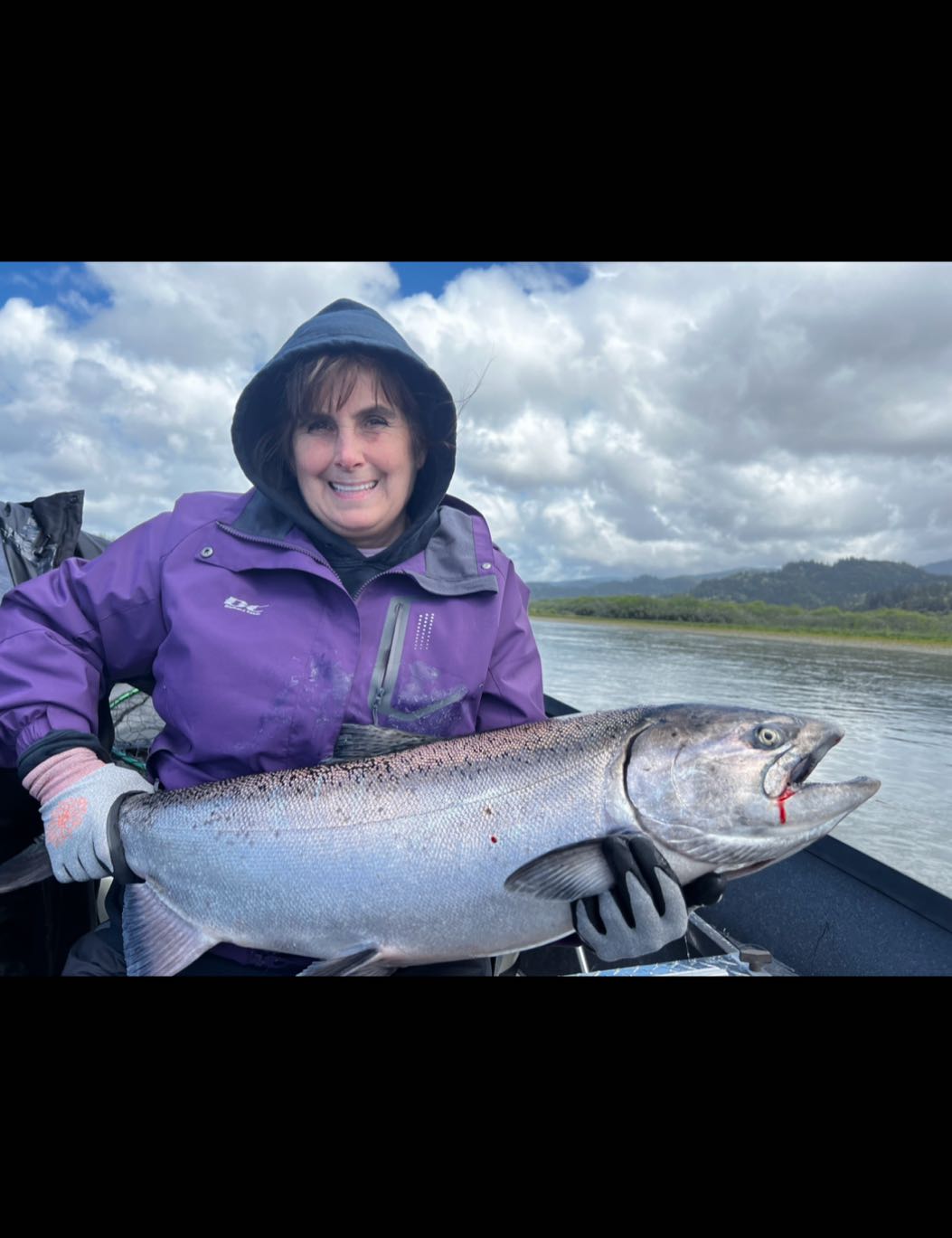 Coho salmon fishing in Brookings, 27-inch fish
