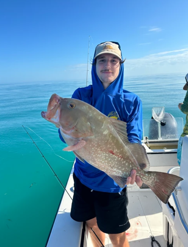 A lone angler fishes in the scenic waters of Key West