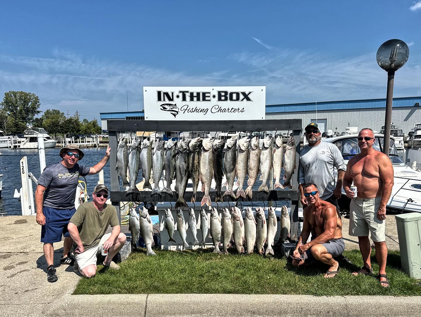 Six people enjoying a fishing trip in St. Joseph