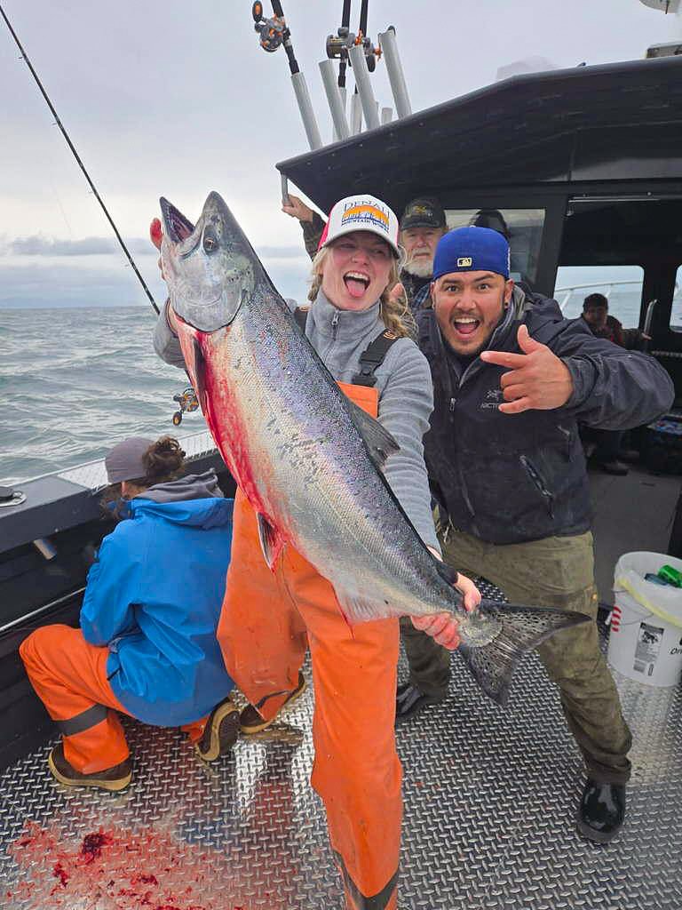 Four people fishing in Homer, Alaska