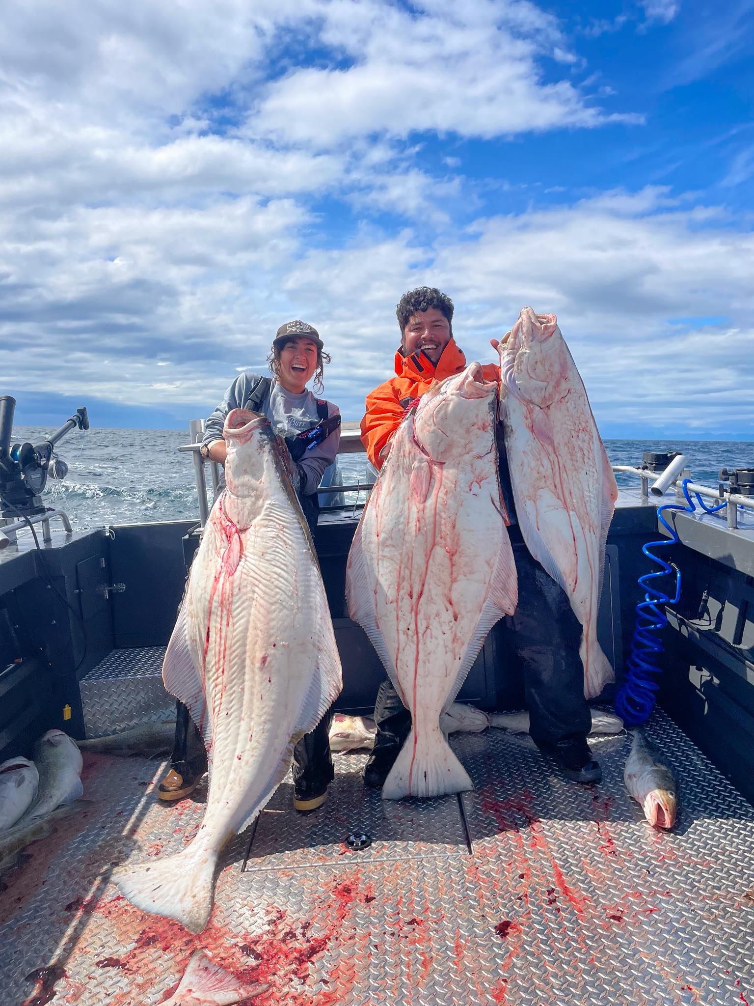 Two people fishing in Homer, Alaska