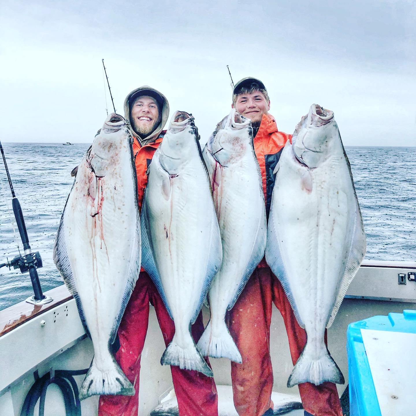 Halibut fishing boat departing Homer Spit for full day Alaska charter in Kachemak Bay waters