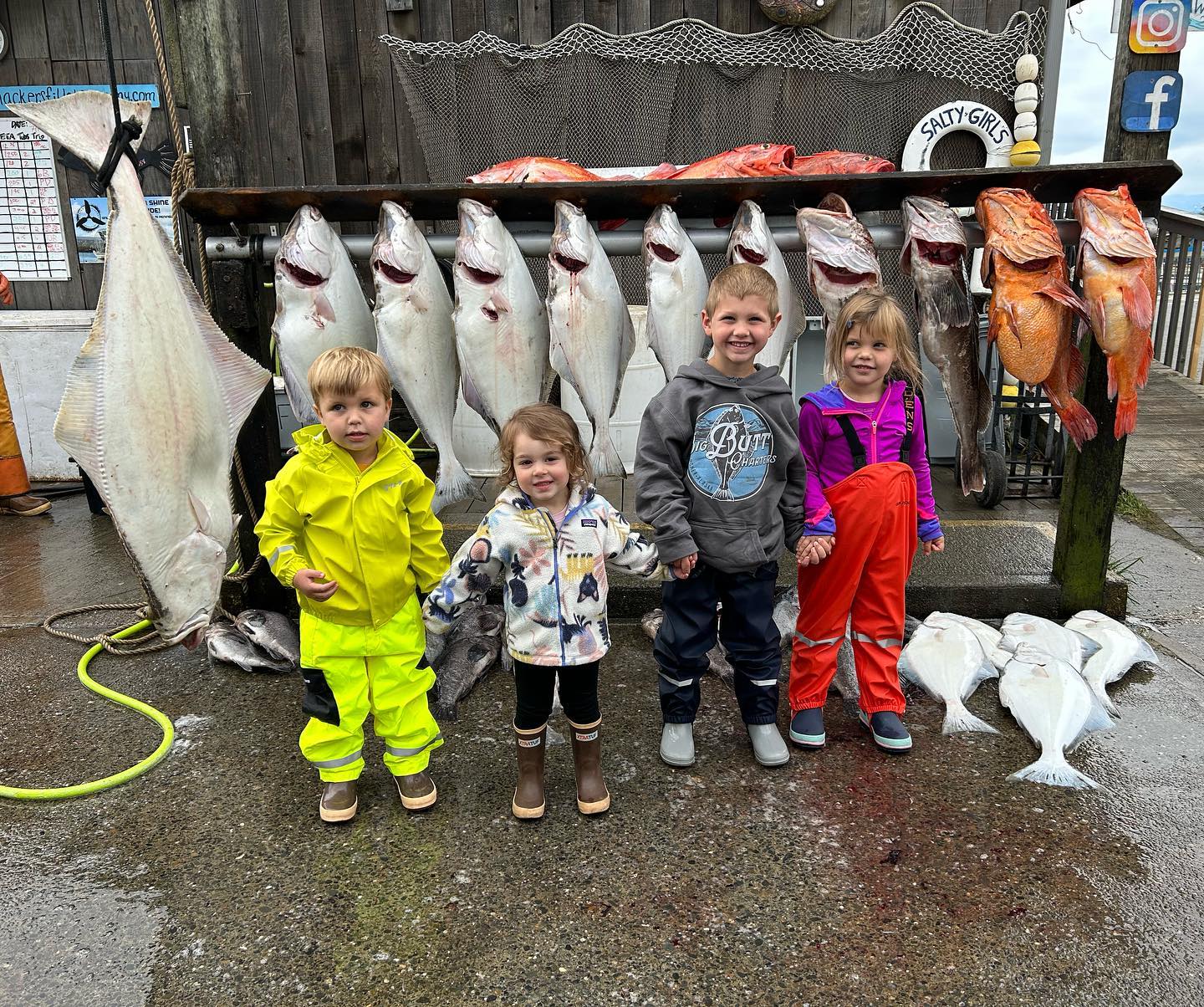 Homer Alaska halibut fishing charter boat on Kachemak Bay with anglers bottom fishing