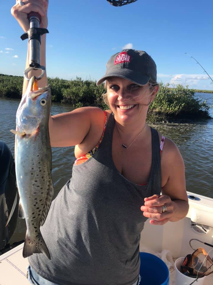 A person fishing at Grand Isle