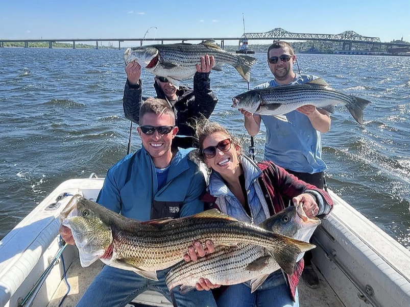 Charter fishing boat on Massachusetts waters targeting striped bass and bluefish near Cape Cod