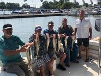 Two anglers fishing in Port Clinton