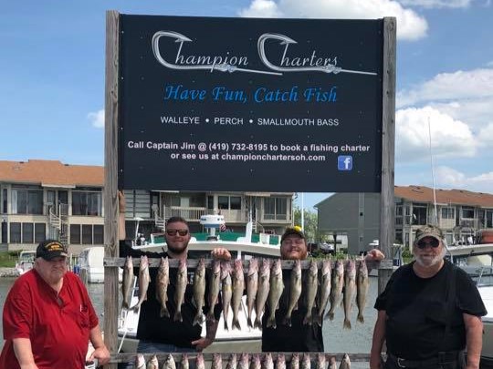Four people fishing in Port Clinton