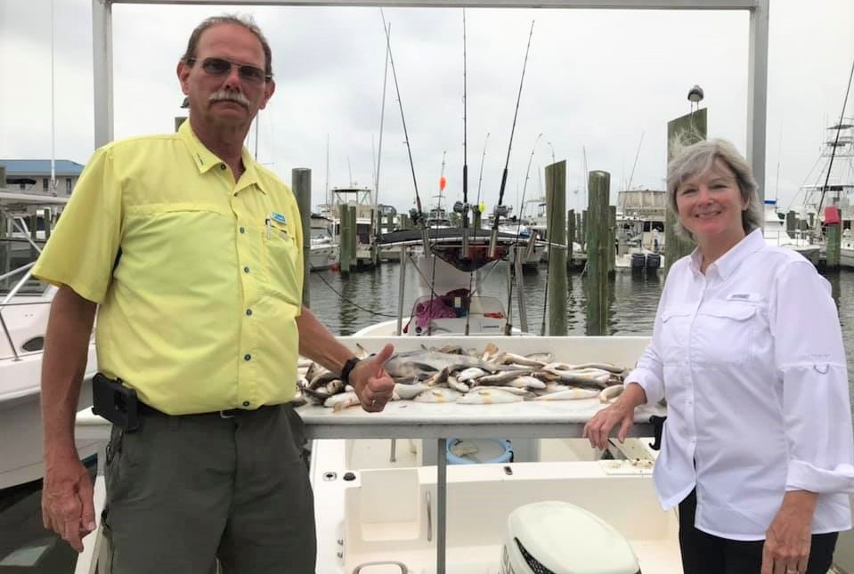 Two people fishing in Biloxi
