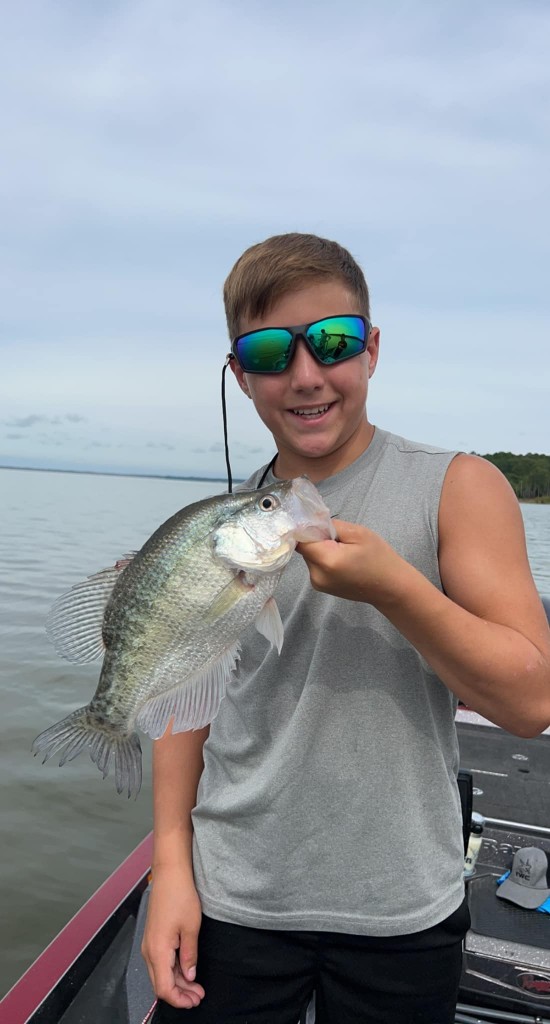 Angler with a white crappie fish caught in MS