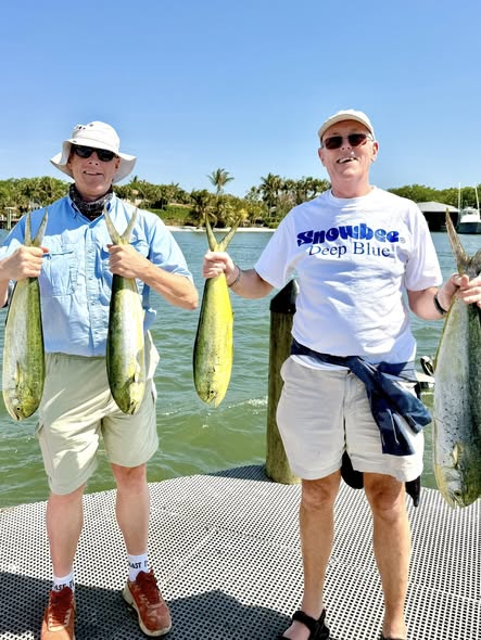Fresh caught mahi mahi displayed on fishing boat deck in Jensen Beach FL