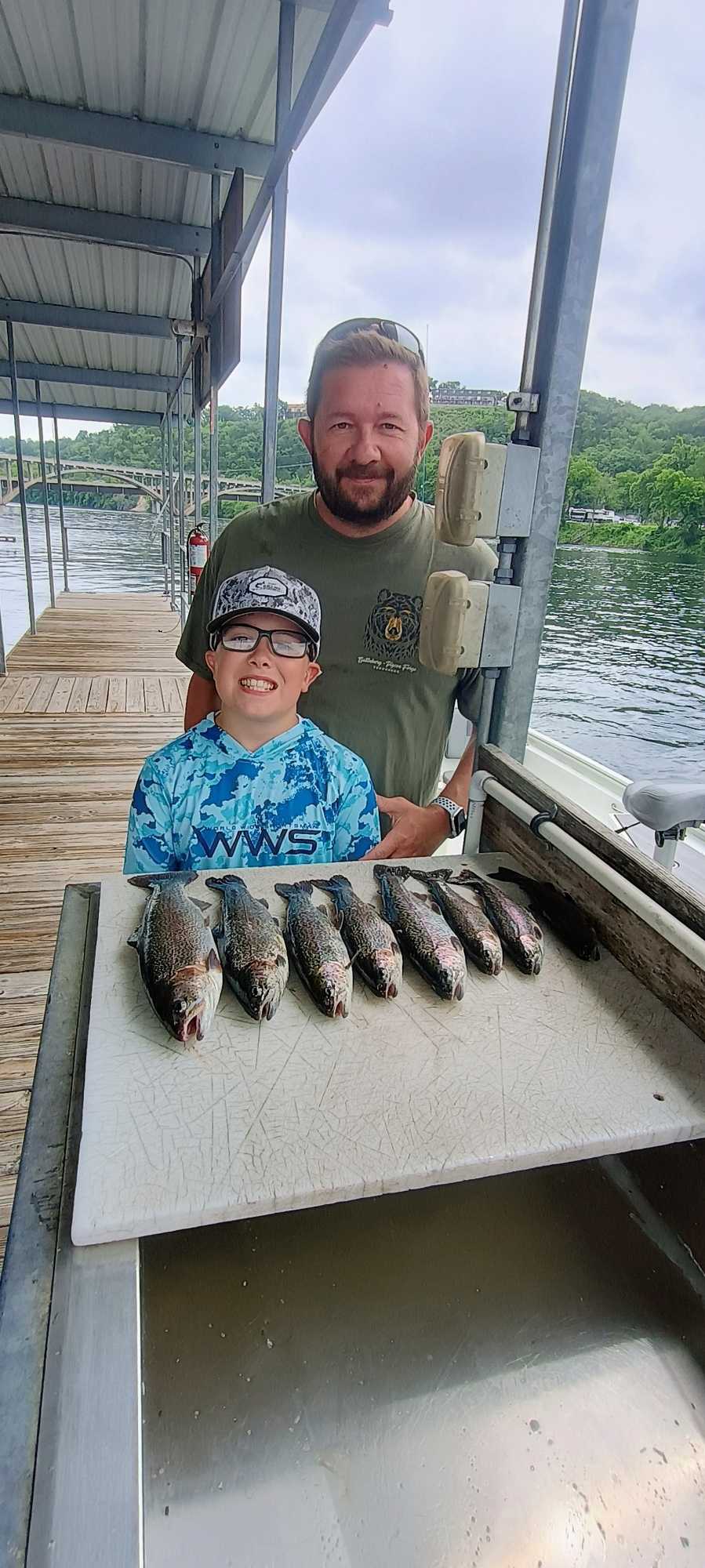 Fresh caught fish displayed on cleaning table at Branson MO fishing dock