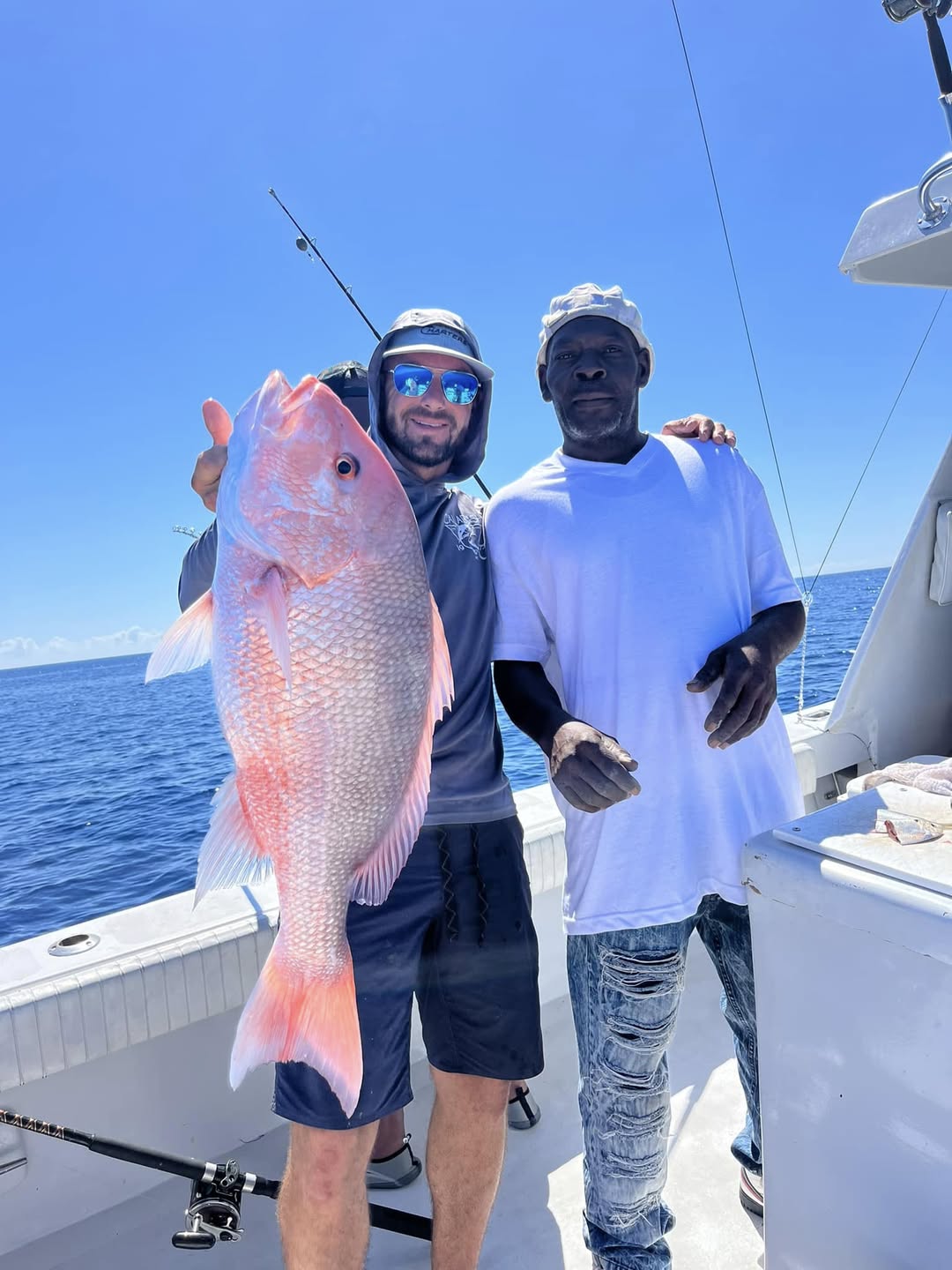 Two anglers fishing on the water in FL
