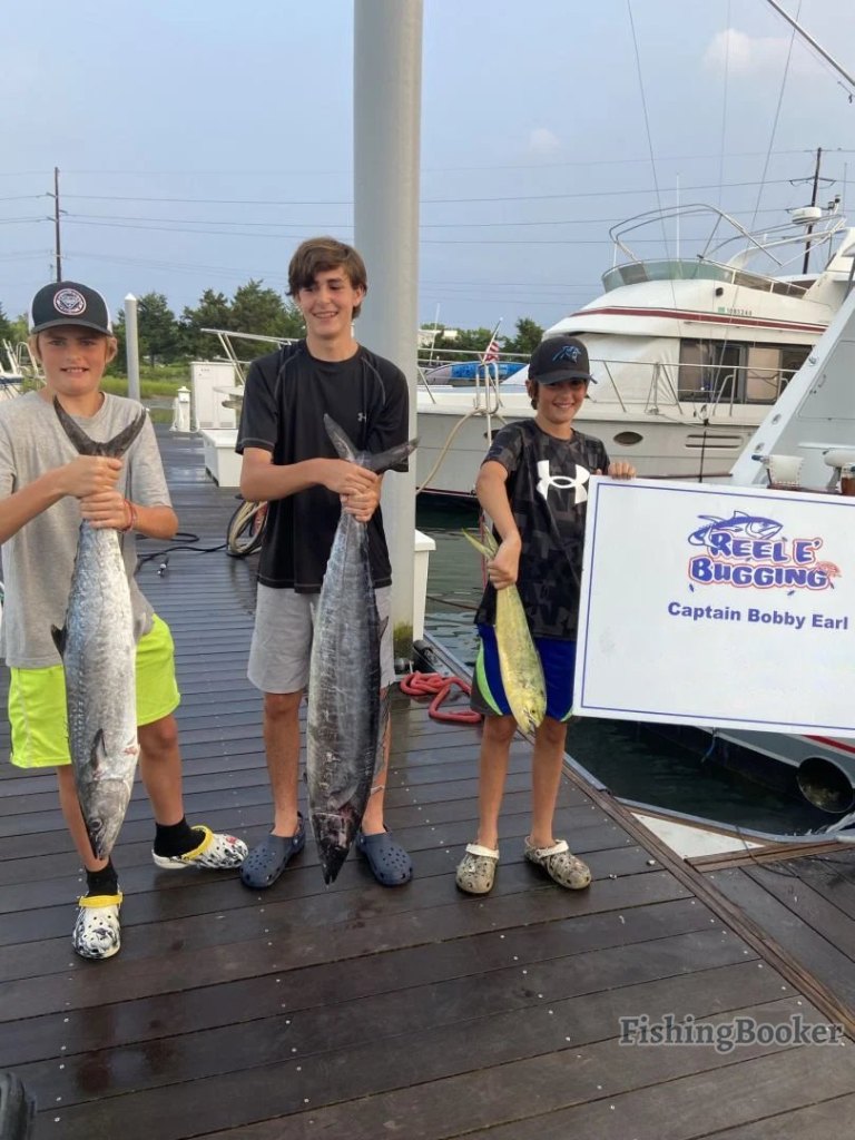 Two wahoo fish and king mackerel, 24 inches long, caught by three people in Morehead City