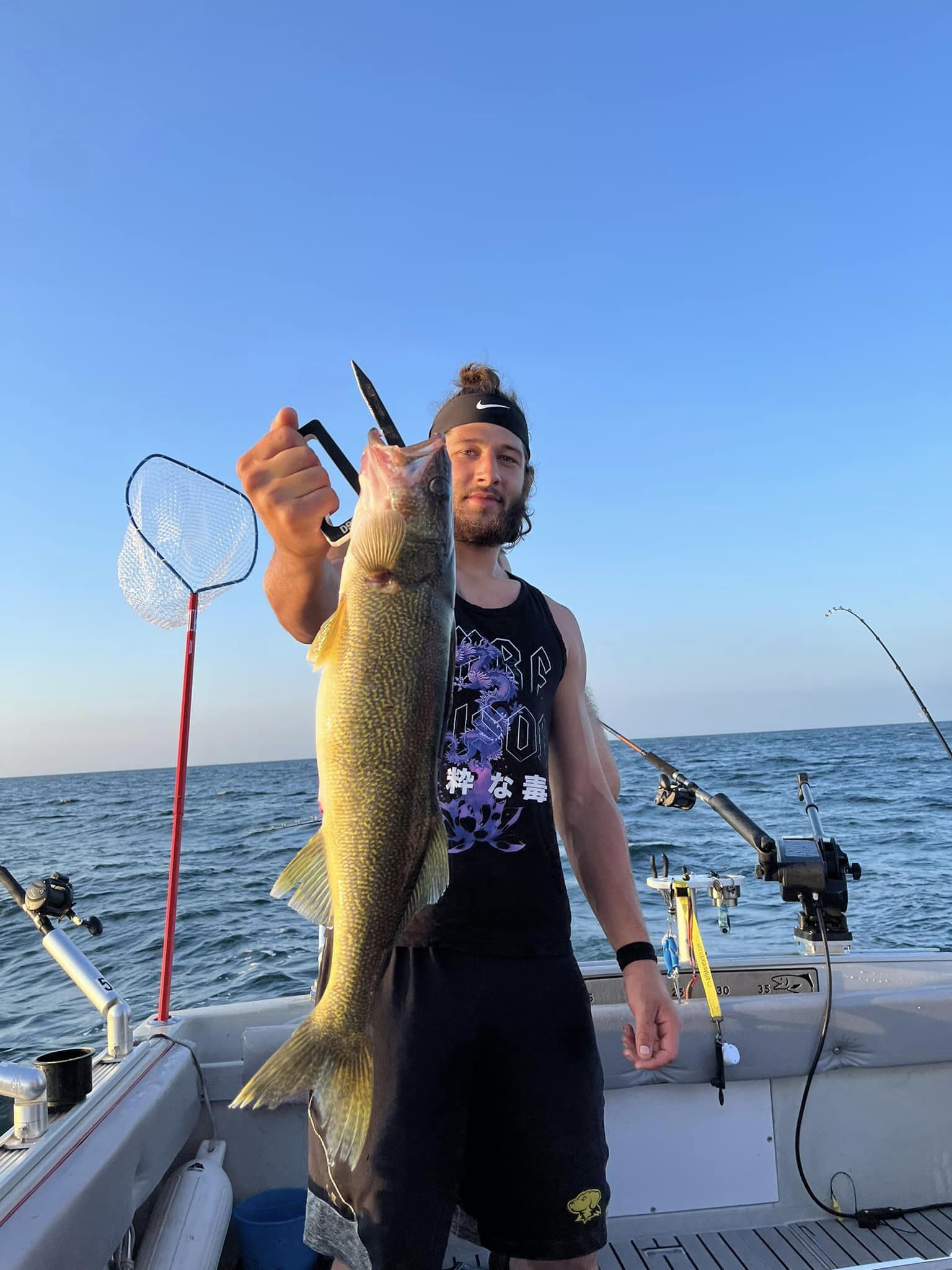 A person fishing in Conneaut with a 39-inch fish