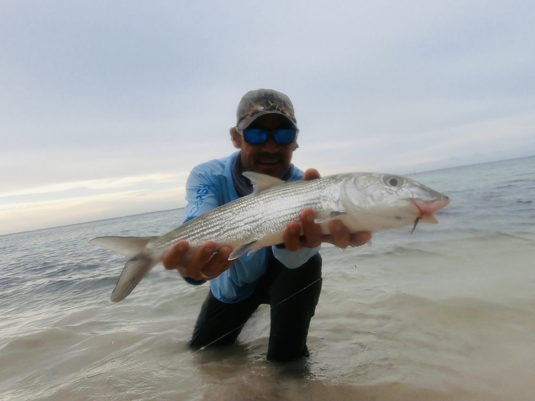 Bonefish catch in shallow water surf fishing in Tavernier FL