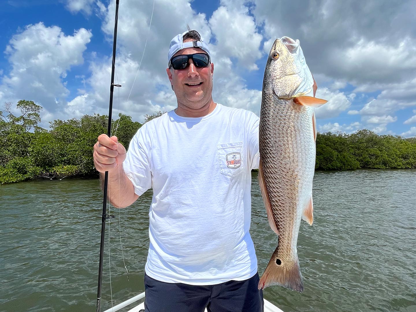 Redfish measuring 27 inches caught while fishing in FL