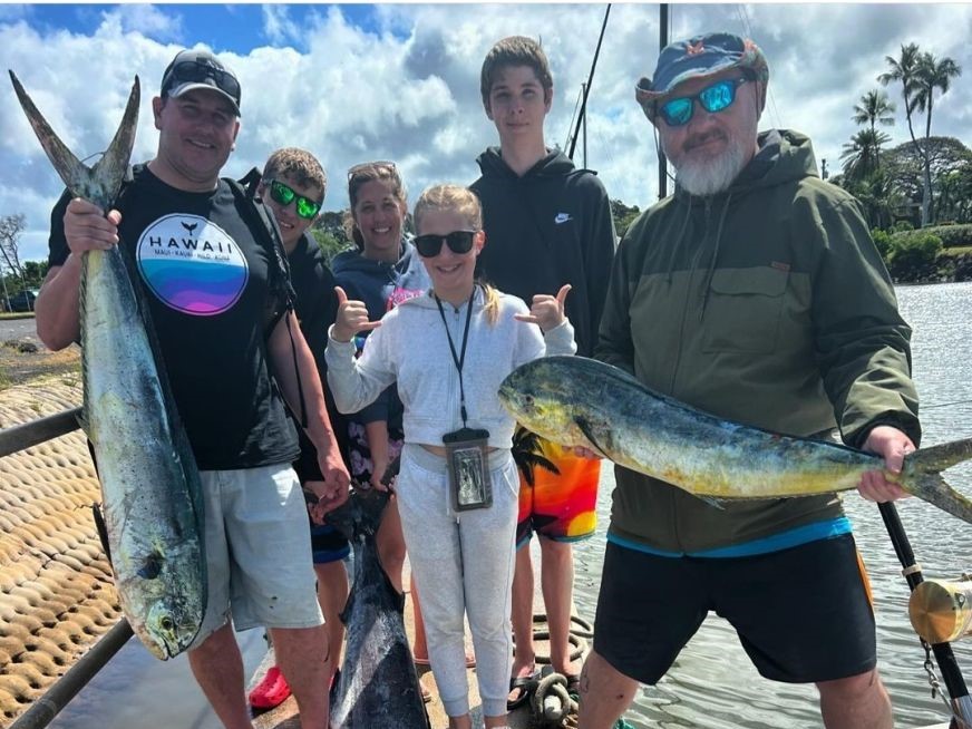 5 people fishing in Haleiwa