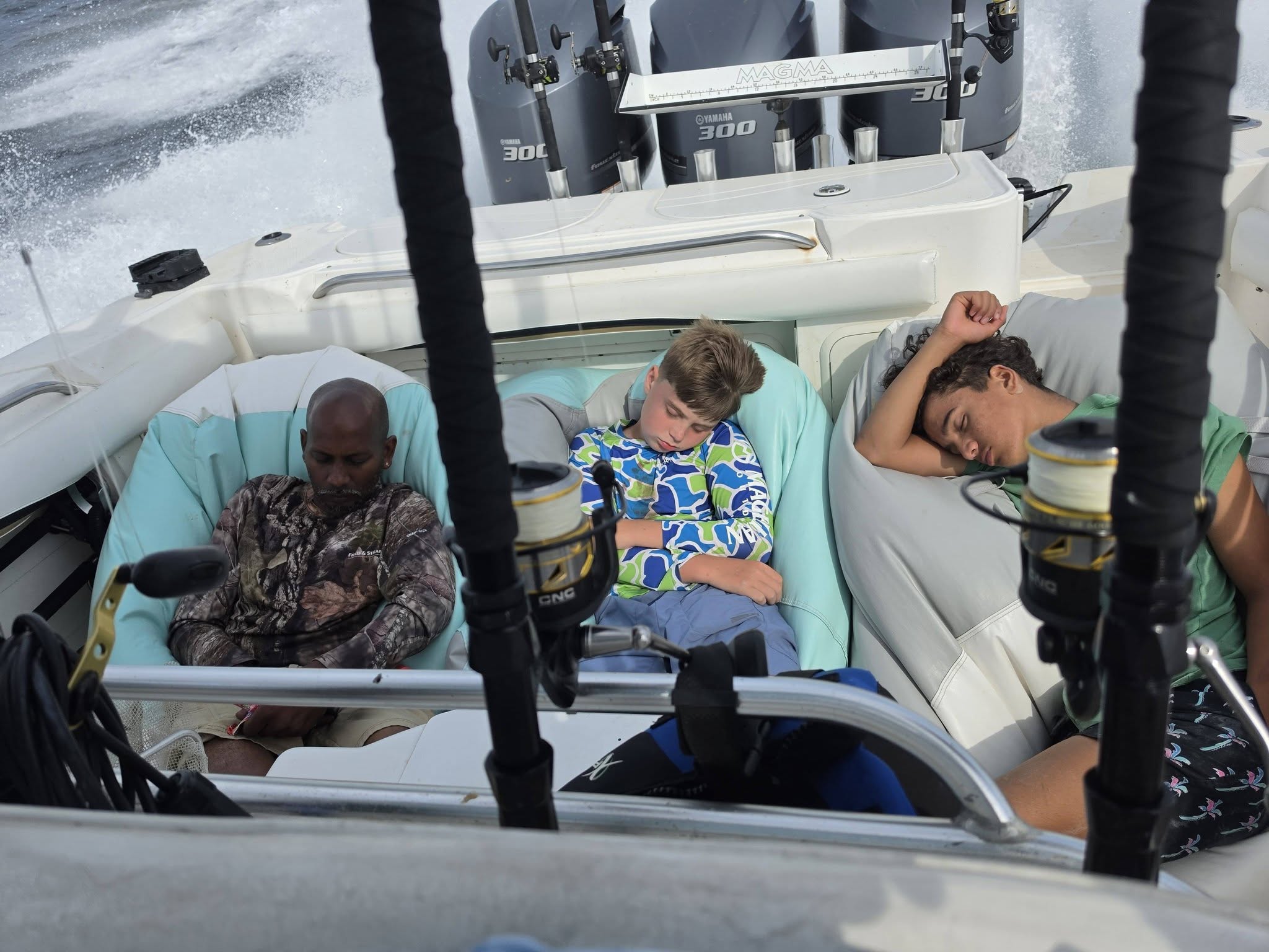 Fishing boat with comfortable seating area and outboard motors at Oak Island NC