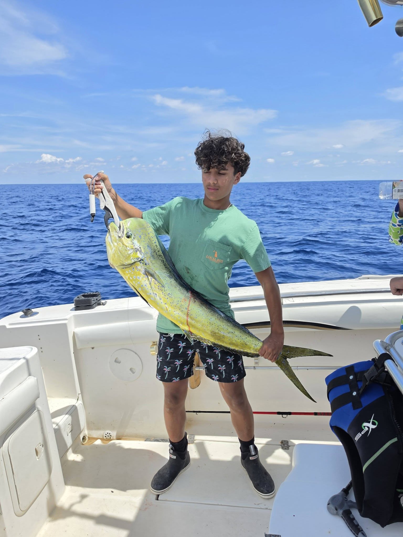 Mahi mahi catch displayed on fishing boat deck in Oak Island NC waters
