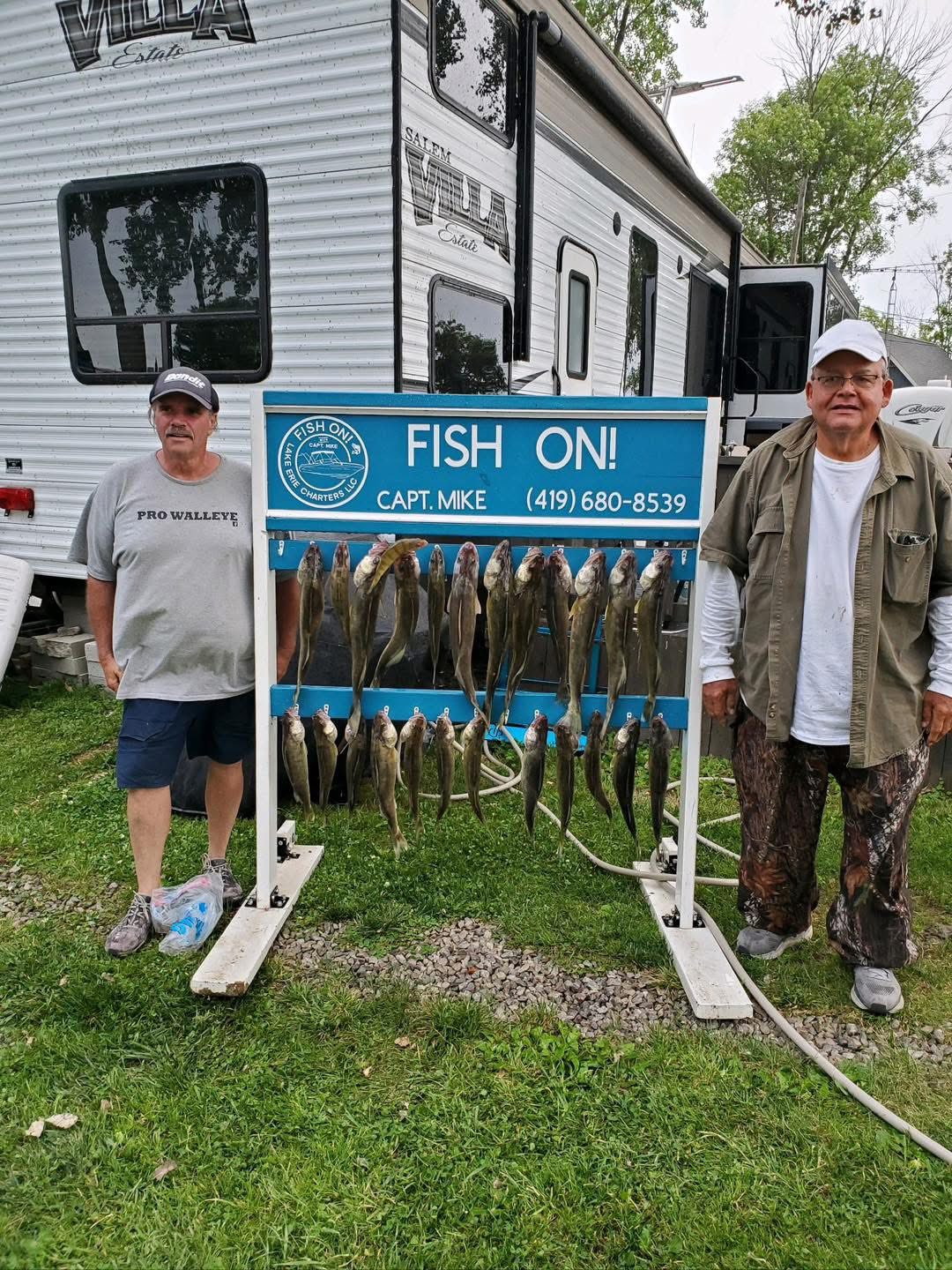 Fishing charter display board showing catch of walleye and other fish species at Lakeside Marblehead OH