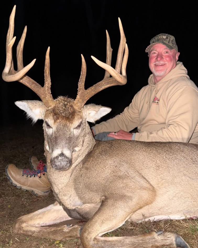 Youth hunter with rifle in Sunfish Valley Ohio whitetail deer hunting trip
