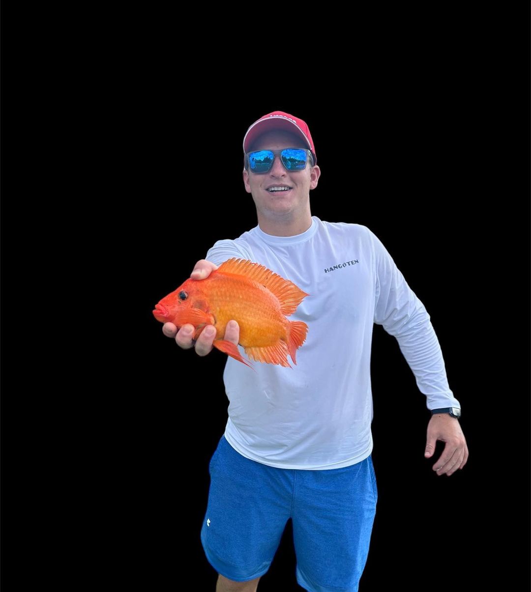 Angler landing a 10-inch fish in FL