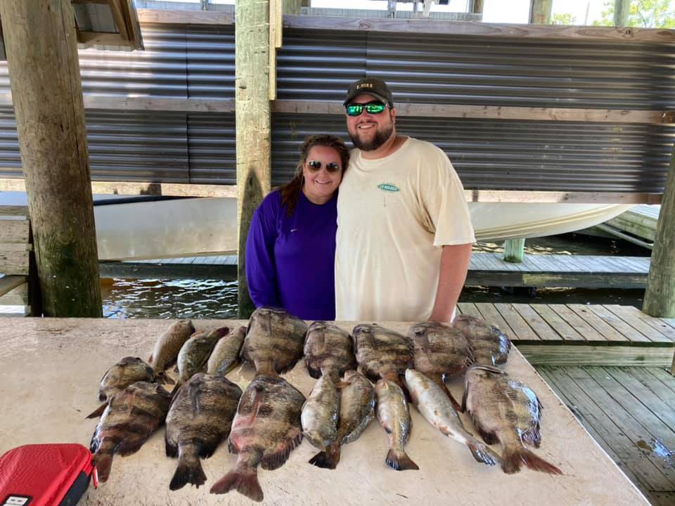 4 fish caught by 3 people in Saint Bernard