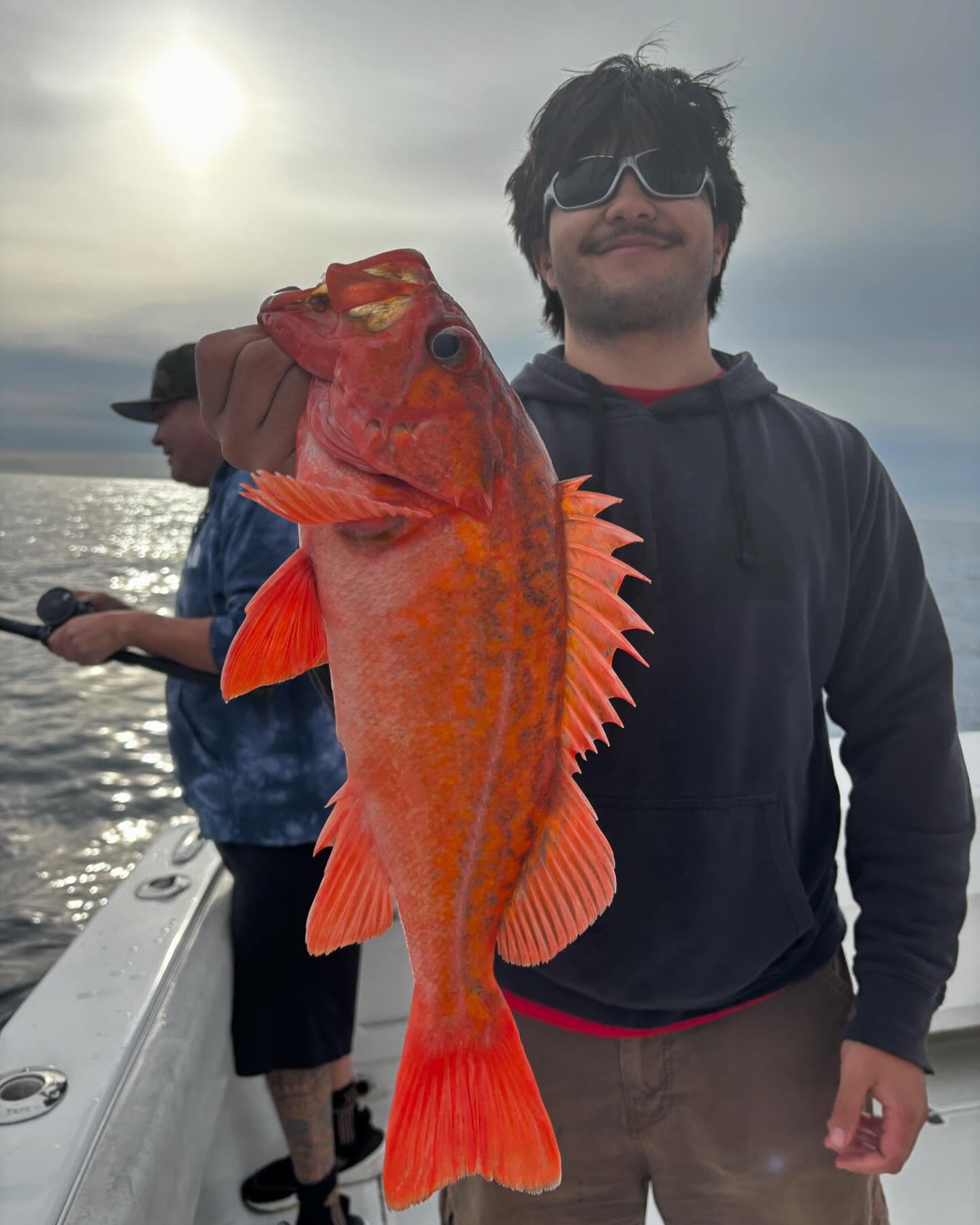 Two people fishing in San Diego