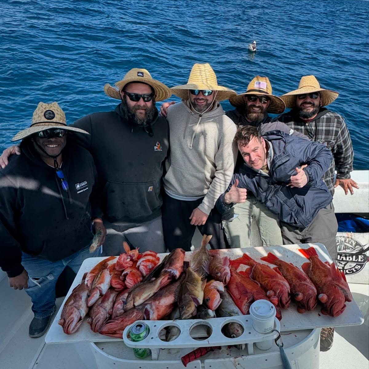 Group of 6 people enjoying fishing in San Diego