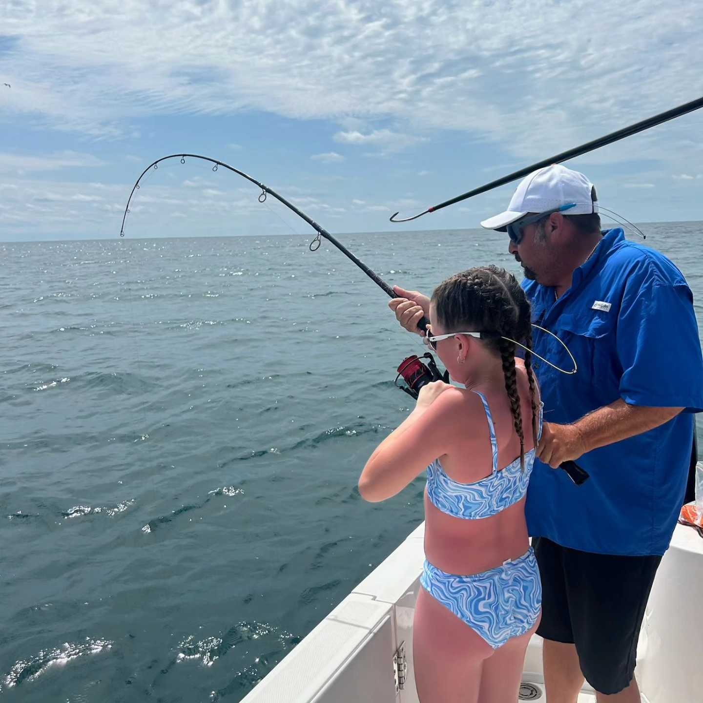 Two people fishing in FL