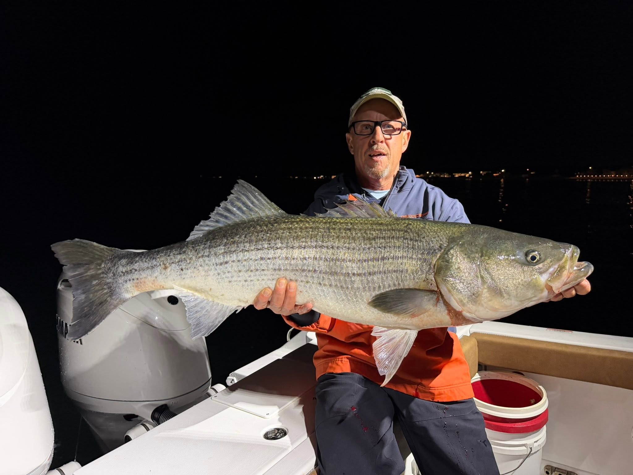 Large striped bass caught during night fishing trip in Wells ME