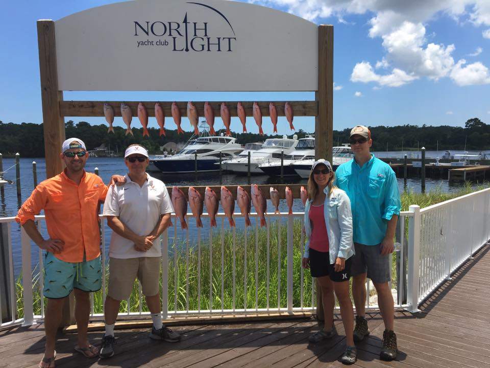 4 people fishing in Destin